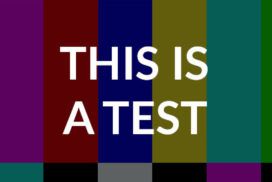 A television screen displaying the words "this is a test" with software testing.
