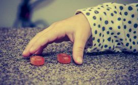 A child's hand reaching for a piece of fruit on Episerver sites.