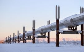 A line of pipelines in the snow.
