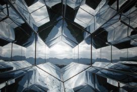 View of a mountain range from a hexagonal glass kaleidoscope