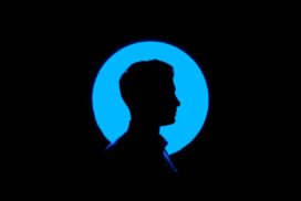 Silhouette of a young man's profile set against a blue circle.