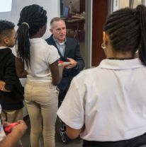 Pat Maher speaks with students from LEARN Charter at SPR's office.