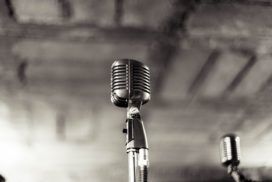A group of microphones in a room.