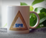 A coffee mug with the 1997 SPR logo on it.