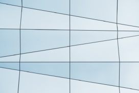 An image of a glass building with lines on it.