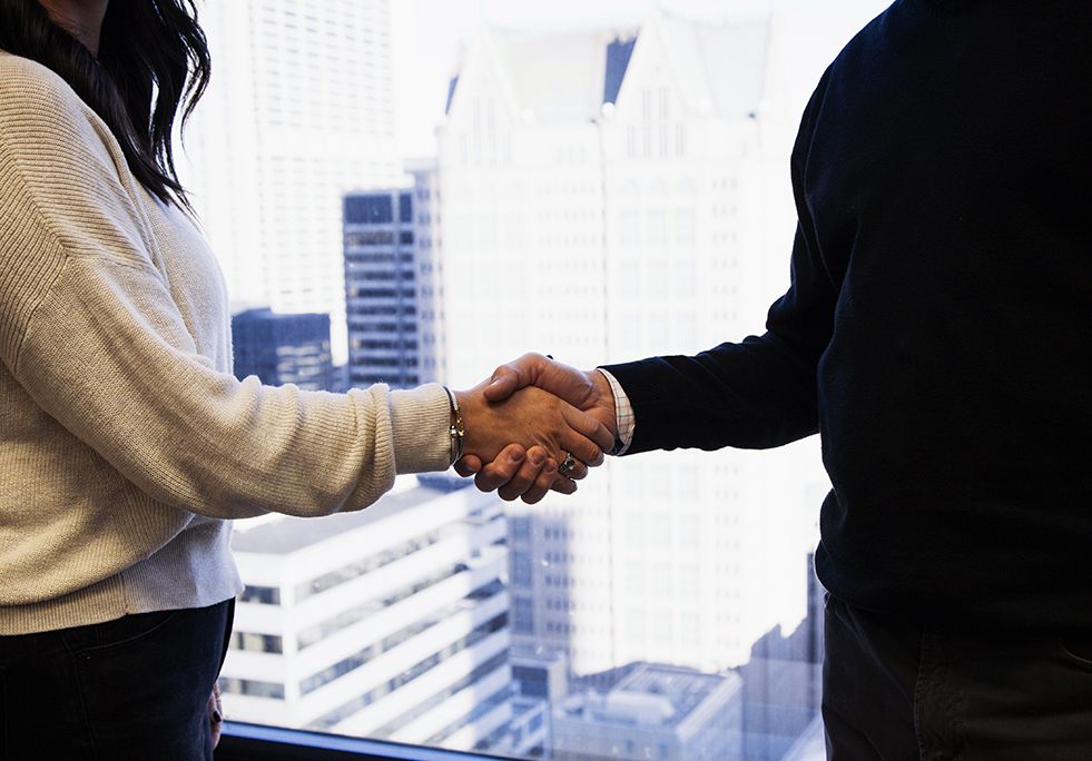 Two people shaking hands