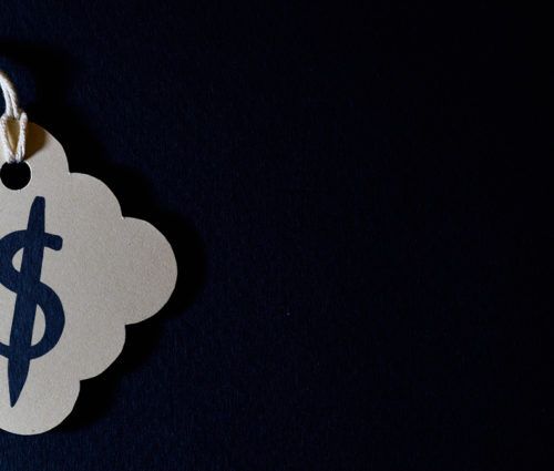 A paper tag with a dollar sign on it, symbolizing cloud cost.