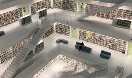 An image of a library with a wide array of bookshelves, showcasing an extensive collection and serving as a data platform for knowledge acquisition.