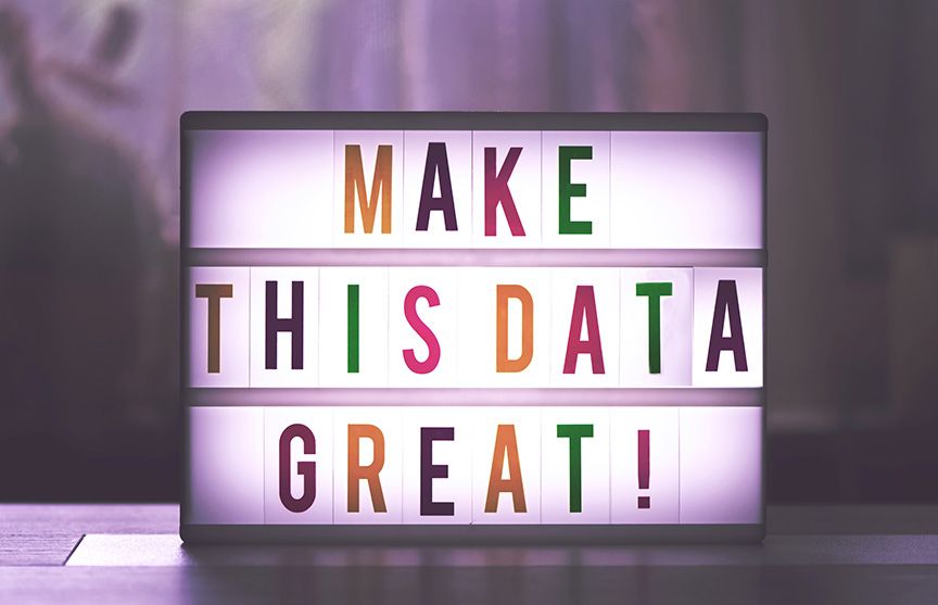 A sign that reads: Make this data great!