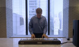 A man playing a keyboard