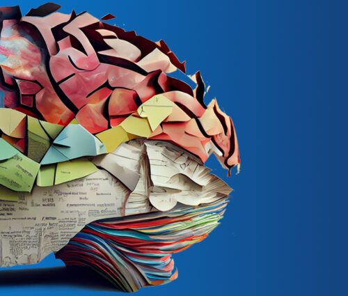 A paper cut out of a brain showcasing future technology predictions.