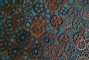 A collection of variously sized, rusty metal gears and cogs arranged closely together on a textured blue surface, evoking the intricate mechanics behind AI agent development lessons.